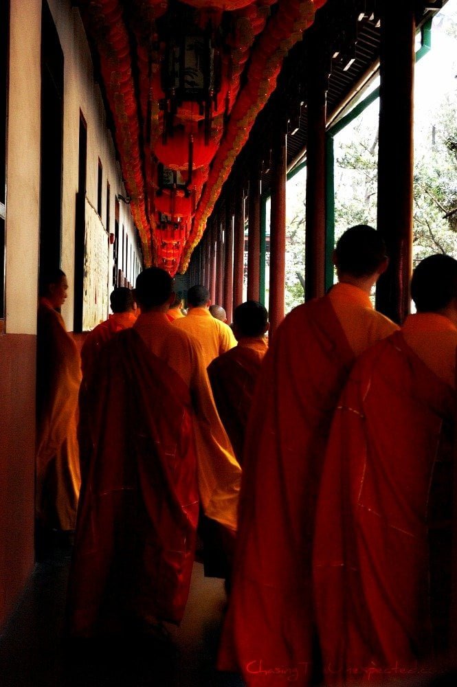 Image: Monks inside Shanghai's Jade Buddha Temple